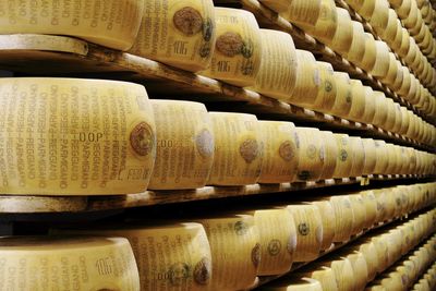 The Reason Why Parmesan Cheese Is So Expensive