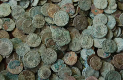 British Man Discovers Half A Million Dollars Worth Of Ancient Coins With His Metal Detector